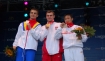Fina? skoku - od lewej: Ilie Daniel POPESCU, Leszek BLANIK, Se Gwang RI - wsplne zdjecie podczas ceremonii wreczania medali.