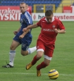 III liga: Wisa II Krakw - Hutnik Krakw 2:0. n/z Patryk Maecki (Wisa II), w tle ukasz Dbski (Hutnik).